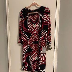 Really cute dress. Goes to about the knees. Size 12 laundry by Shelli segal
